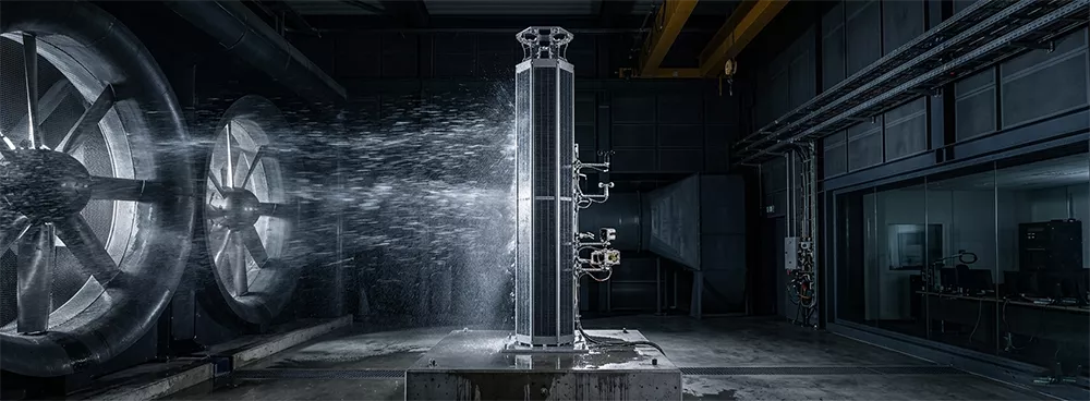 Hexagonal solar pylon wind load test, solar power pole sa matinding weather simulation, industrial wind tunnel testing para sa photovoltaic structures, matibay na solar column sa ilalim ng high-velocity wind..webp