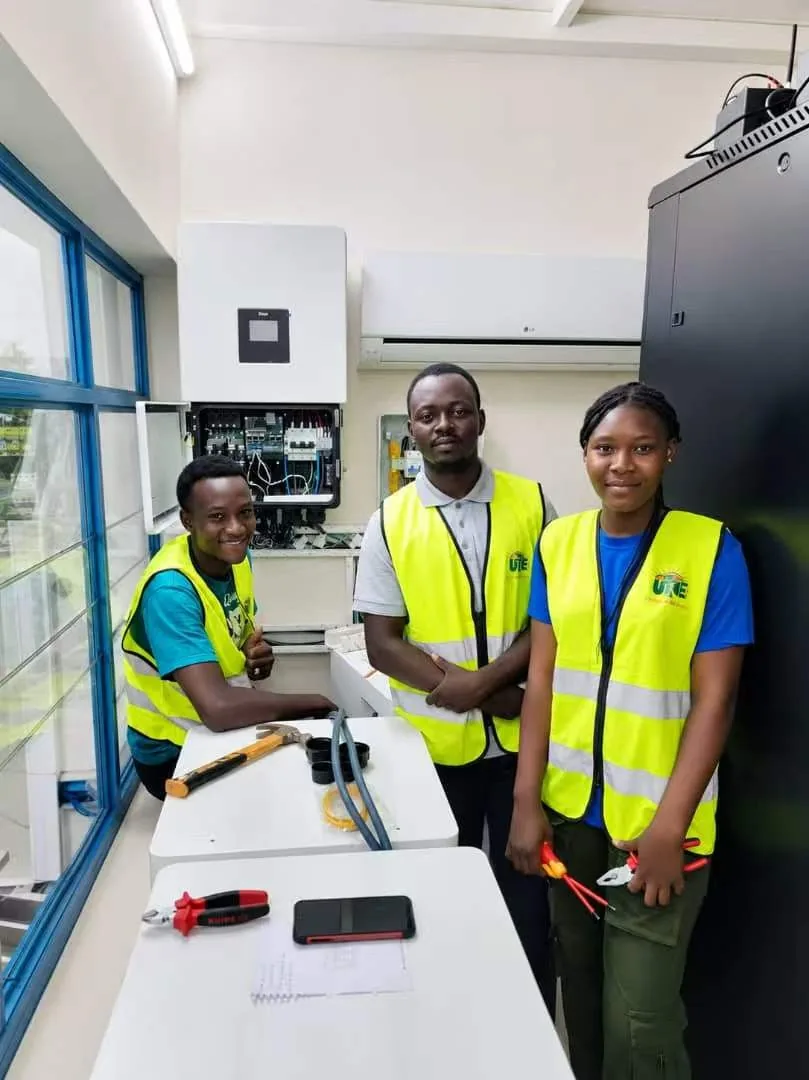 E-Able Power partner technicians in a technical training laboratory with electrical equipment