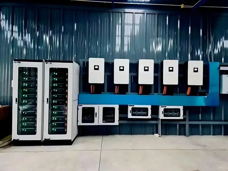 E-Able Power BESS — battery racks with five inverters installed in a warehouse utility area